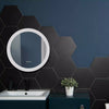 Amsterdam Hexagon Matt Black Porcelain Wall and Floor Tile on Bathroom Wall, Half Wall is Tiled with the hexagon, the other half is painted navy blue. There Sink Unit and bathroom cuboard is also navy blue