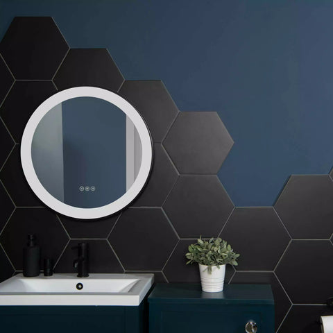 Amsterdam Hexagon Matt Black Porcelain Wall and Floor Tile on Bathroom Wall, Half Wall is Tiled with the hexagon, the other half is painted navy blue. There Sink Unit and bathroom cuboard is also navy blue