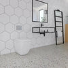 Amsterdam Hexagon Matt White Porcelain Wall and Floor Tile on Bathroom Wall, with Black Bathroom features and Freestanding Toilet