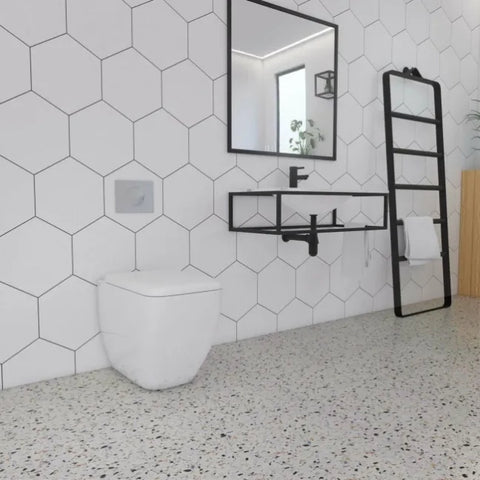 Amsterdam Hexagon Matt White Porcelain Wall and Floor Tile  on Bathroom Wall, with Black Bathroom features and Freestanding Toilet