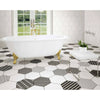 Amsterdam Matt Hexagon Monochrome Pattern Wall and Floor Tile on Bathroom Floor Mixed with the Matching Plain White Hexagon Tiles Avaliable, in the Bathroom is a freestanding bath with gold hardware