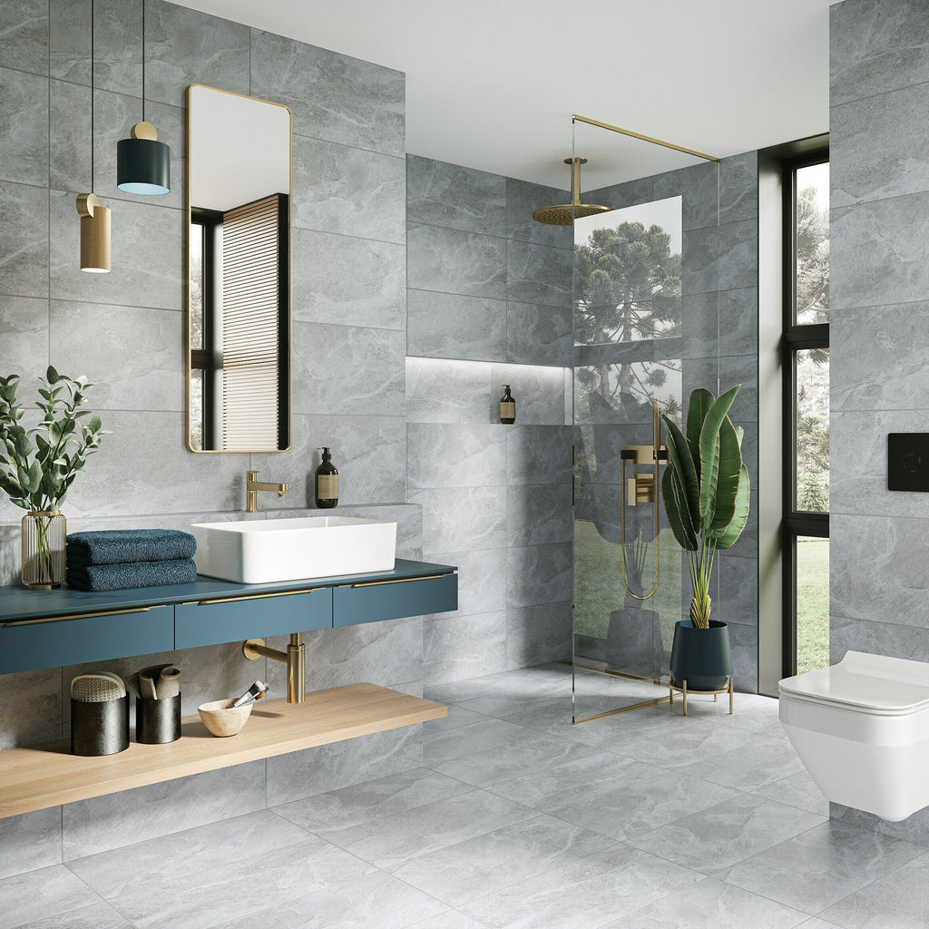 Ark Slate Cloud Grey Stone Effect 30x60cm Porcelain Wall and Floor Tile in Open Plan Bathroom with Gold and Blue Features