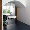Avatar Matt Navy Blue Hexagon Porcelain Wall and Floor Tile on Bathroom Floor with Matching White Tiles on Wall