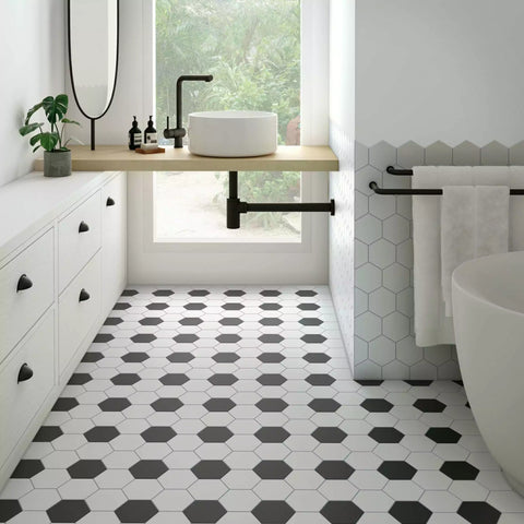 Avatar Matt White Hexagon Porcelain Wall and Floor Tile on Bathroom Wall, and On Floor mixed with the matching black hexagon tiles