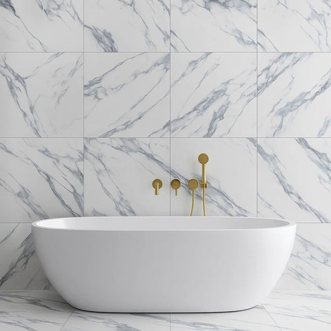White Marble Effect Tiles with Blue Veining on Bathroom Wall behind free standing bathtub with gold features