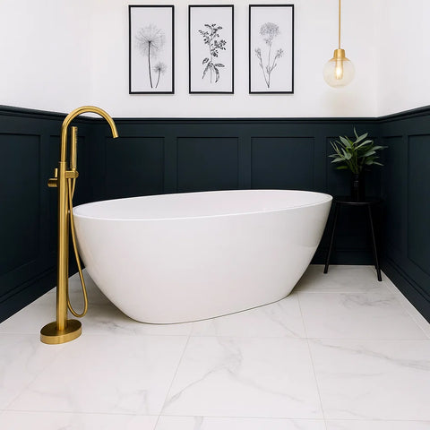 Modern Bathroom featuring Soft White Carrara Marble Effect Tiles on Floor with Free Standing Bathtub and Gold Tap