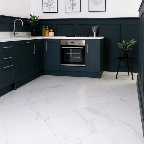 Modern Kitchen with Soft White Carrara Marble Effect Tiles on Floor, contrasted by bold blue counter tops
