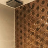 Rose Gold and Copper Bronze Hexagon Mosaic Wall Tile on Bathroom Wall Close Up
