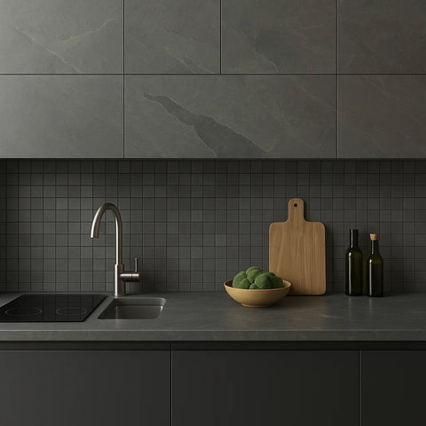 Modern kitchen with dark gray tiles, a sink, and minimal decor.