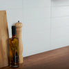White Gloss Flat Metro Ceramic Wall 100x300mm Tile on Kitchen Wall close up