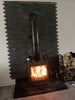 Quartzite Black Sparkle Split Face Wall Tiles behind fireplace