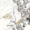 Close-up of a white marble surface with gray, black, and gold veins