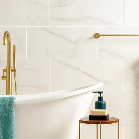 Modern Bathroom with Soft White Carrara 60x30cm Gloss Porcelain Tiles on Wall, Free Standing Bath Tub, and Gold Finishings 