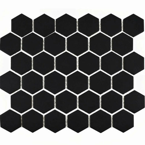 Hexagonal black tiles arranged in a pattern on a white background