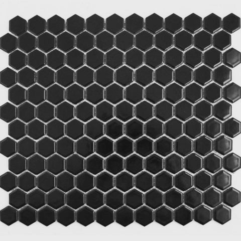 Hexagonal black tiles arranged in a mosaic pattern