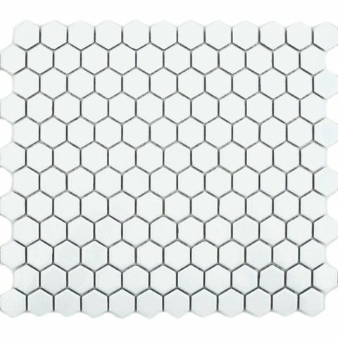 Hexagonal white tiles with black grout on a white background