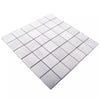 A square mosaic tile sheet made of small light gray to white rectangular tiles with subtle marbled veining, shown at an angle on a plain white background.