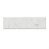A rectangular white marble tile with subtle gray veining, shown horizontally against a plain white background.