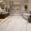 Modern bathroom with white and black marble tiles, a freestanding bathtub, and a shower area.