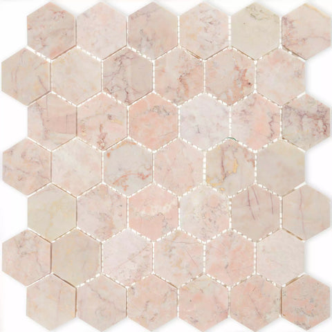 Hexagonal marble mosaic tiles in a light pink and beige pattern
