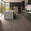 Modern kitchen with marble island and dark wood effect tiled floor